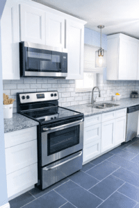 Kitchen Remodel in White Oak, Cincinnati—OH | Upgrades include new appliances, tile, backsplash, granite and lighting